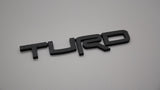 Toyota Turd Badge